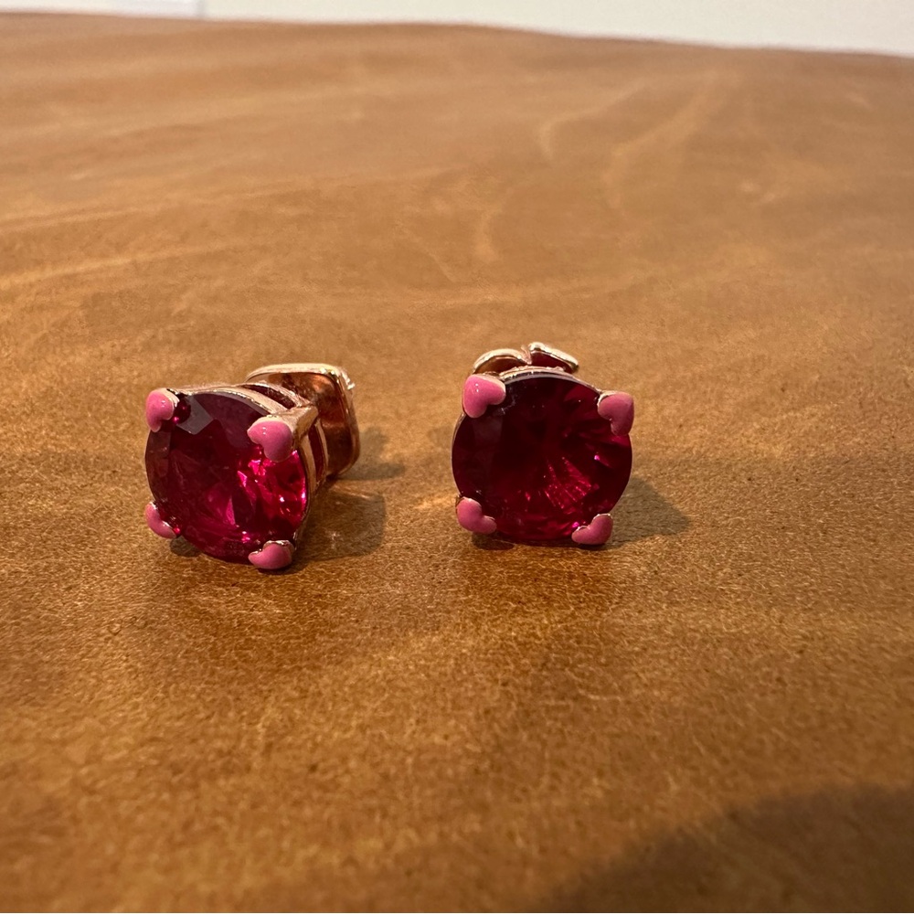 Kate Spade ruby studs with heart accent